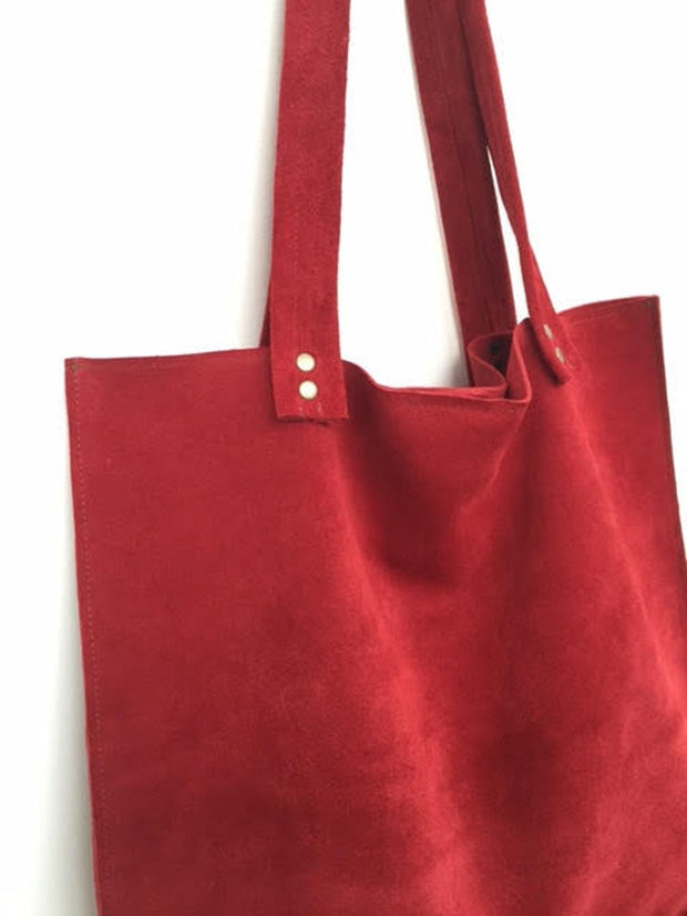 Red leather suede handbag